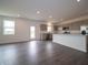Open-concept design with modern kitchen featuring stainless steel appliances and an expansive living space at 210 Aster Way, Greenfield, IN 46140