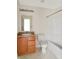 Standard bathroom with linoleum flooring, vanity, toilet and tub/shower combo at 2138 Rossington Ln, Indianapolis, IN 46229