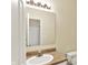 Cozy bathroom featuring a vanity with a crisp white sink, plus a mirror, and a toilet at 2270 Brightwell Pl, Indianapolis, IN 46260