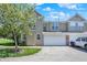Charming townhome with a driveway, garage, and landscaping at 2270 Brightwell Pl, Indianapolis, IN 46260