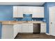 Bright kitchen featuring stainless steel appliances and white cabinets, complemented by light countertops at 2270 Brightwell Pl, Indianapolis, IN 46260