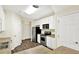 Modern kitchen with stainless steel appliances, neutral countertops, and wood flooring at 2270 Brightwell Pl, Indianapolis, IN 46260