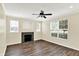 Inviting living room featuring wood floors, neutral walls, and a fireplace at 2270 Brightwell Pl, Indianapolis, IN 46260