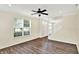 Bright living room with wood flooring, neutral walls, and a ceiling fan at 2270 Brightwell Pl, Indianapolis, IN 46260