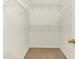 A large walk-in closet has white wire shelves to help keep you organized at 2270 Brightwell Pl, Indianapolis, IN 46260