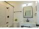 Modern bathroom featuring a bathtub, sleek vanity, and matte black hardware at 2302 Prospect St, Indianapolis, IN 46203