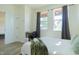Bright bedroom featuring a comfortable bed and desk area at 2302 Prospect St, Indianapolis, IN 46203