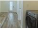 Modern laundry area with a washer and dryer, located conveniently near the entrance for ease of use at 2302 Prospect St, Indianapolis, IN 46203