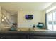 Inviting living room featuring a stylish chair and staircase at 2302 Prospect St, Indianapolis, IN 46203