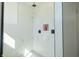 Luxurious shower features marble tile, dual shower heads, black hardware, and a built-in niche for toiletries at 2302 Prospect St, Indianapolis, IN 46203