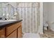 Functional bathroom with tub and shower combination and tile flooring at 2427 Apple Tree Ln, Indianapolis, IN 46229