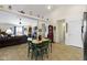 Open floor plan with kitchen, dining area, and living room providing easy access to each living space at 2427 Apple Tree Ln, Indianapolis, IN 46229
