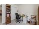 This office features a functional desk, storage and ample natural light, creating a perfect workspace at 2427 Apple Tree Ln, Indianapolis, IN 46229