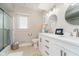 Bright bathroom featuring a double vanity with ample storage, and a glass-enclosed shower at 2428 Hawthorn Pl, Noblesville, IN 46062