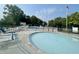 Inviting community pool area with lounge chairs, umbrellas, and a separate wading pool for Gathering fun and relaxation at 2428 Hawthorn Pl, Noblesville, IN 46062