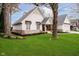 Beautiful exterior of a home with nice landscaping, large trees, and a well maintained lawn at 2428 Hawthorn Pl, Noblesville, IN 46062