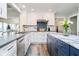 Modern kitchen featuring stainless steel appliances, white cabinets, and a functional layout at 2428 Hawthorn Pl, Noblesville, IN 46062