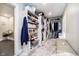 Spacious walk-in closet with custom shelving and ample storage for clothing and accessories at 2428 Hawthorn Pl, Noblesville, IN 46062