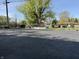 Spacious backyard area with a large tree, shed, and potential for outdoor activities at 244 E Cragmont Dr, Indianapolis, IN 46227