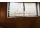 Close-up of a basement window at 244 E Cragmont Dr, Indianapolis, IN 46227