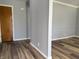 Clean, freshly painted walls with new floors and white trim at 244 E Cragmont Dr, Indianapolis, IN 46227
