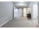 Finished basement featuring neutral paint, plush carpeting and a modern vanity at 2545 Coneflower Ct, Columbus, IN 47201