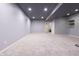 Spacious finished basement area featuring neutral paint, recessed lights and plush carpeting at 2545 Coneflower Ct, Columbus, IN 47201
