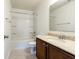 Bathroom featuring tub, shower, and vanity with granite countertop at 2545 Coneflower Ct, Columbus, IN 47201