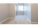 Bedroom featuring neutral paint, plush carpeting and mirrored closet doors at 2545 Coneflower Ct, Columbus, IN 47201