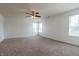Spacious bedroom features neutral carpeting and lots of natural light at 2545 Coneflower Ct, Columbus, IN 47201