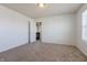 Bedroom with neutral carpet and a window allowing natural light at 2545 Coneflower Ct, Columbus, IN 47201