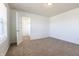 Bedroom with neutral carpet and an open closet door for ample storage at 2545 Coneflower Ct, Columbus, IN 47201
