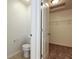 Toilet room with access to closet featuring wire shelving at 2545 Coneflower Ct, Columbus, IN 47201