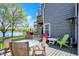 Backyard deck with lake view, outdoor seating, and gray wood siding at 2809 Somerset Bay, Indianapolis, IN 46240