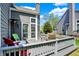 Backyard deck with outdoor seating, and gray wood siding at 2809 Somerset Bay, Indianapolis, IN 46240