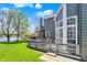 Backyard deck with outdoor seating and a beautiful view of the lake and lush greenery at 2809 Somerset Bay, Indianapolis, IN 46240