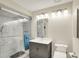 Bright bathroom featuring a glass shower, sleek vanity, and modern fixtures at 2809 Somerset Bay, Indianapolis, IN 46240