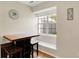Bright breakfast nook showcases built-in seating and window, promoting a relaxing spot at 2809 Somerset Bay, Indianapolis, IN 46240