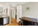 Cozy breakfast nook features butcher block table with convenient seating and white pantry at 2809 Somerset Bay, Indianapolis, IN 46240