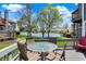 Inviting deck area perfect for outdoor dining, with lake views and comfortable seating at 2809 Somerset Bay, Indianapolis, IN 46240