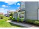 Charming home featuring lush greenery, well-manicured lawn and welcoming curb appeal at 2809 Somerset Bay, Indianapolis, IN 46240