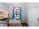 Bright ' bedroom featuring a comfortable bed, and natural light at 2822 Walker Ave, Indianapolis, IN 46203