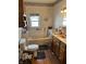 Standard bathroom with a tub and shower combo, a vanity, and patterned wallpaper at 3333 S Sr 9, Greenfield, IN 46140