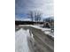 Shows a small building and picnic tables on snowy grounds with a cloudy sky above at 3333 S Sr 9, Greenfield, IN 46140