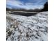 A snowy landscape featuring a patch of black covering under a clear blue sky at 3333 S Sr 9, Greenfield, IN 46140