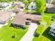 Stunning aerial view of home showcasing well-manicured lawn, mature trees and landscaping at 3413 Putter Pl, Columbus, IN 47203