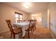 Cozy dining room featuring a large table perfect for gatherings, with a view to the living space at 3413 Putter Pl, Columbus, IN 47203