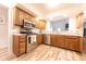 View of kitchen appliances, wood cabinets, and stylish countertops, creating a functional cooking space at 3413 Putter Pl, Columbus, IN 47203