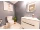 Powder room featuring modern vanity and toilet at 3413 Putter Pl, Columbus, IN 47203