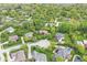 An aerial view of homes in a residential area with tree-lined streets and well-maintained yards at 3790 Steeplechase Dr, Carmel, IN 46032